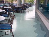 A Simple Epoxy Repair to the Faux Travertine outdoor epoxy floor coating at The Aquarium in Downtown Houston by Slip Free Systems 1929 County Road 129 Pearland TX 77581 www.slipfreesystems.com 281-482-5577 