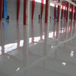 Shiny Empty Warehouse Floor by Slip Free Systems