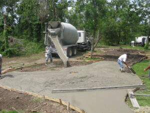 COncrete truck pouring patio