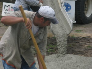 Cement Application Man Spreading Wet Product
